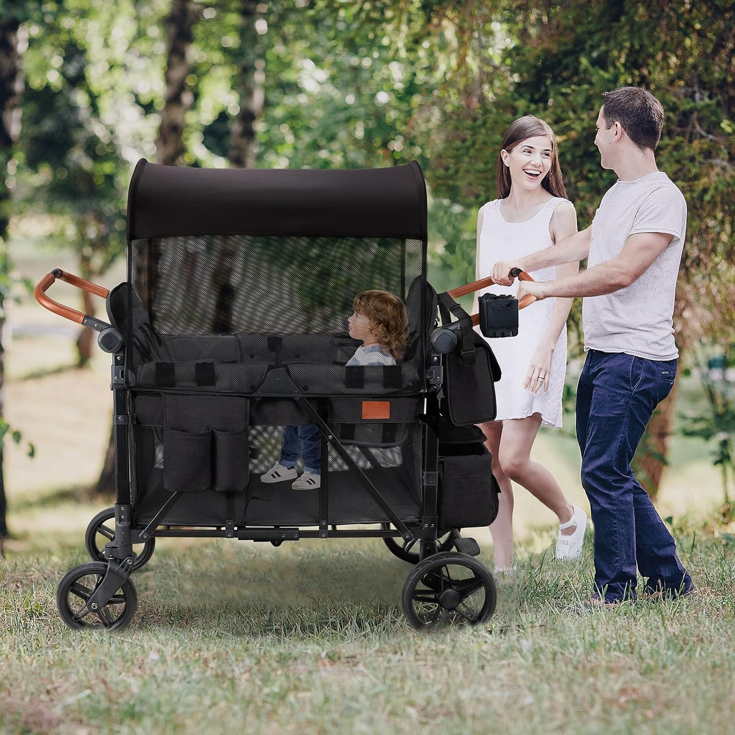 Wagon Stroller for 4 Kids, All-Terrain Wagon for Toddler with Canopy, Parent Organizer, Shoulder Bag, Adjustable Handlebar, Phone Holder, High Seat & 5 Point Harness, Ultimate Quad (Black)